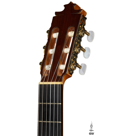 The headstock of a 1995 Francisco Barba flamenco guitar made of cedar and cypress