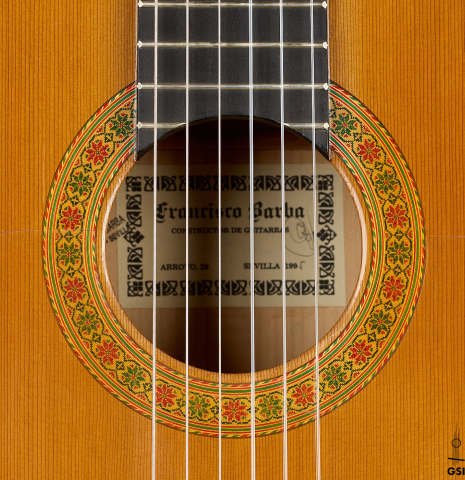 The rosette of a 1995 Francisco Barba flamenco guitar made of cedar and cypress