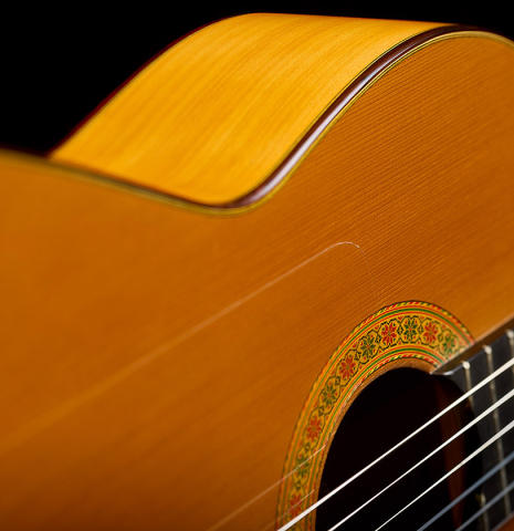 The soundboard and side of a 1995 Francisco Barba flamenco guitar made of cedar and cypress
