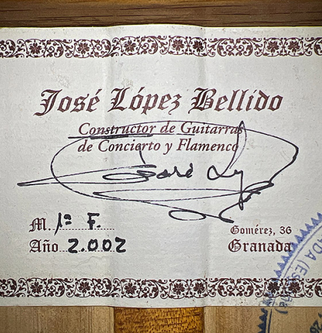 The label of a 2002 Jose Lopez Bellido 1aF flamenco guitar made of spruce and cypress