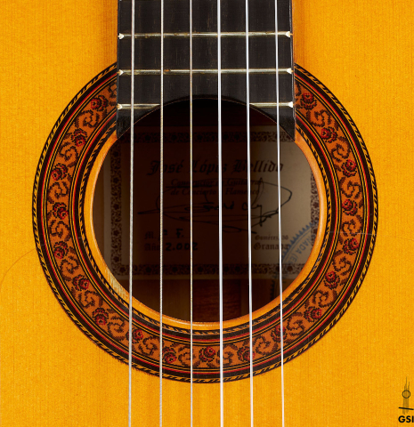The rosette of a 2002 Jose Lopez Bellido 1aF flamenco guitar made of spruce and cypress