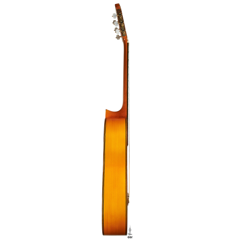 The side of a 2002 Jose Lopez Bellido 1aF flamenco guitar made of spruce and cypress