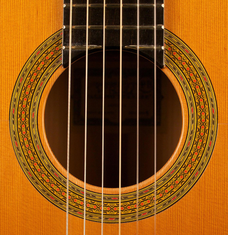 The rosette of a 2004 Paulino Bernabe "Blanca" flamenco guitar made of cedar and cypress