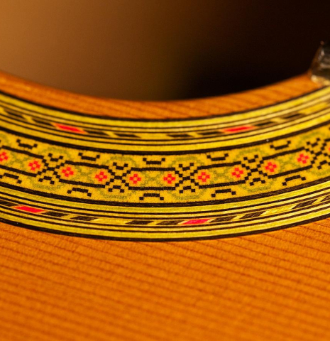 The rosette of a 2004 Paulino Bernabe "Blanca" flamenco guitar made of cedar and cypress