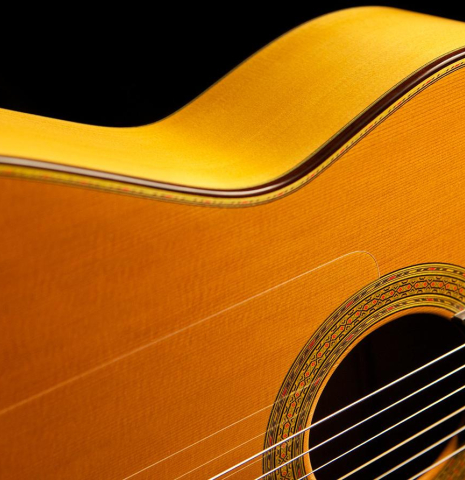 The soundboard and side of a 2004 Paulino Bernabe "Blanca" flamenco guitar made of cedar and cypress