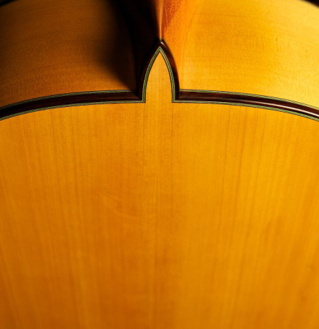 The back and heel of a 2004 Paulino Bernabe "Blanca" flamenco guitar made of cedar and cypress