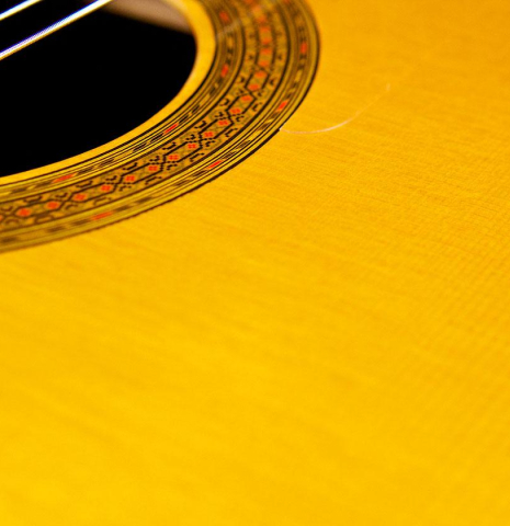 The soundboard of a 2004 Paulino Bernabe "Flamenco Negra" flamenco guitar made of spruce and CSA rosewood