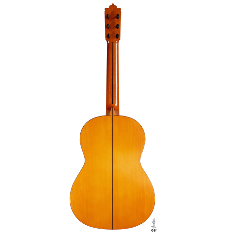 The back of a 1978 Paulino Bernabe "Blanca" flamenco guitar made of cedar and cypress with traditional wooden tuning pegs