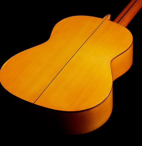 The back and sides of a 1978 Paulino Bernabe "Blanca" flamenco guitar made of cedar and cypress with traditional wooden tuning pegs