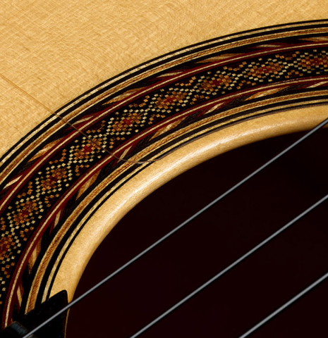 Close-up detail of the rosette of a 2026 Jakob Biehler "Flamenca Blanca" with pegs made of spruce and cypress
