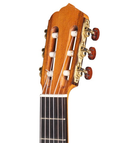 The headstock of a 1996 Tobias Braun flamenco blanca guitar made of spruce and cypress