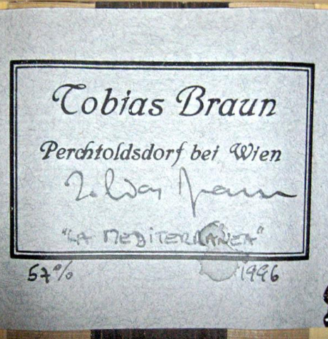 The label of a 1996 Tobias Braun flamenco blanca guitar made of spruce and cypress