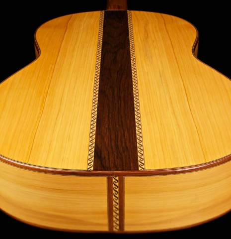 The back and sides of a 1996 Tobias Braun flamenco blanca guitar made of spruce and cypress
