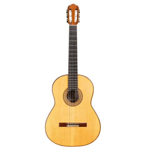 The front of a 1996 Tobias Braun flamenco blanca guitar made of spruce and cypress