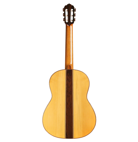 The back of a 1996 Tobias Braun flamenco blanca guitar made of spruce and cypress