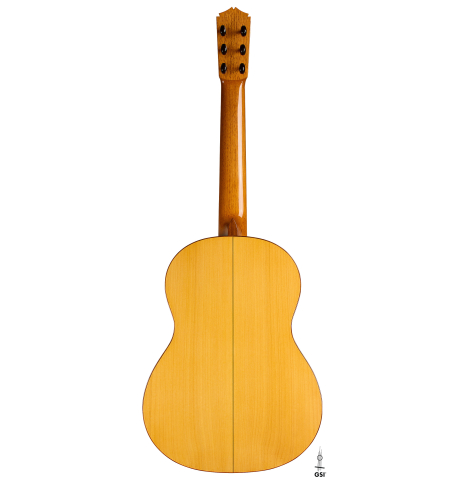 The back of a 2012 Ron Bushman w/pegs flamenco guitar made of spruce and cypress