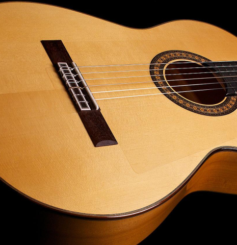 The soundboard of a 2022 Hermanos Camps &quot;Primera Blanca&quot; flamenco guitar made of spruce and cypress