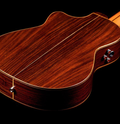 The back of a 2022 Hermanos Camps &quot;FL11C Negra&quot; flamenco guitar made of spruce and Indian rosewood