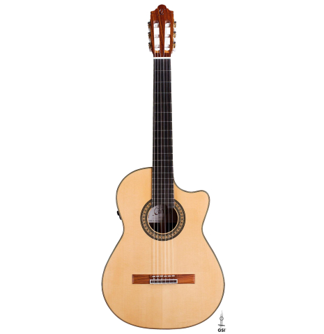 The front of a 2022 Hermanos Camps &quot;FL11C Negra&quot; flamenco guitar made of spruce and Indian rosewood