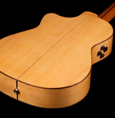 The back and sides of a Hermanos Camps &quot;FL11C Blanca&quot; flamenco guitar made of spruce and cypress