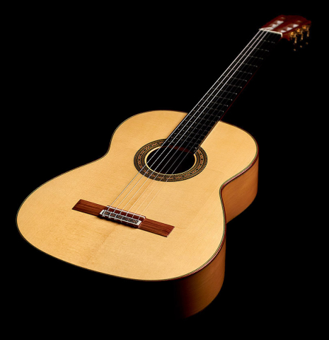 The front of a 2022 Vicente Carrillo "1aF Blanca" flamenco guitar made with spruce top and cypress back and sides