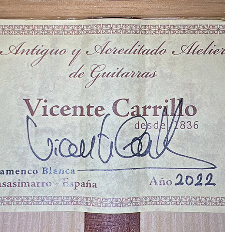 The label of a 2022 Vicente Carrillo &quot;1aF Blanca&quot; flamenco guitar made with spruce top and cypress back and sides