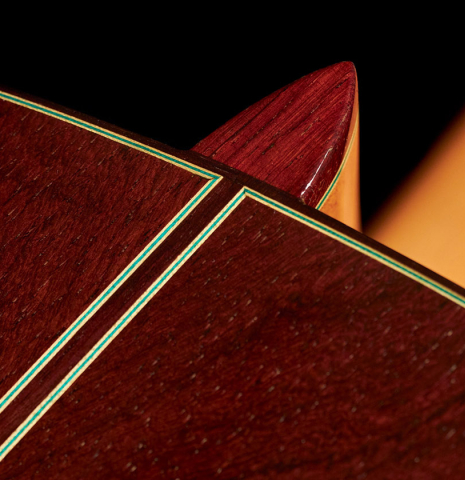 The African rosewood back and heel of a 2022 Vicente Carrillo "1aF Negra" flamenco guitar