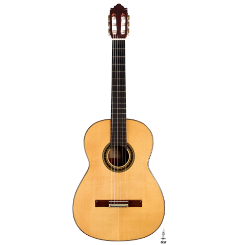 The front of a 2004 Vicente Carrillo &quot;1aF Negra&quot; flamenco guitar made of spruce and padauk