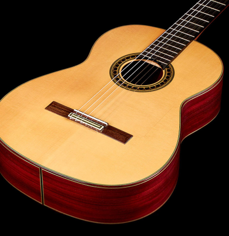 The front of a 2004 Vicente Carrillo &quot;1aF Negra&quot; flamenco guitar made of spruce and padauk