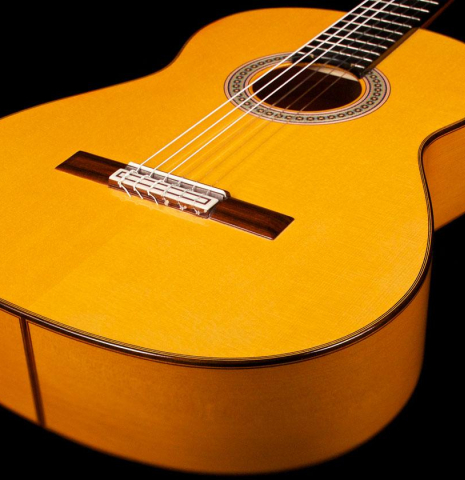 The soundboard, bridge and side of a 2014 Felipe Conde &quot;FC 26&quot; w/pegs SP/CY flamenco guitar