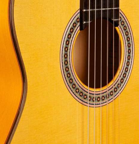 The soundboard and rosette of a 2014 Felipe Conde &quot;FC 26&quot; w/pegs SP/CY flamenco guitar