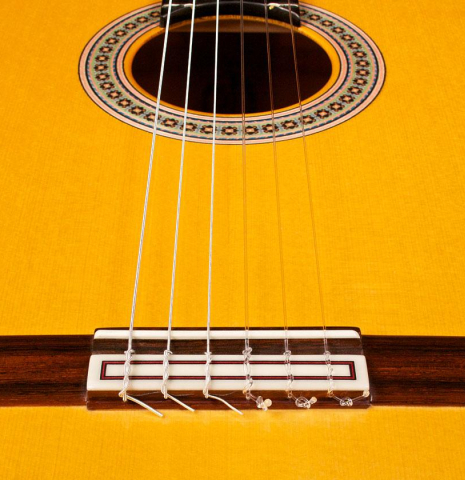 The bridge and saddle of a 2014 Felipe Conde &quot;FC 26&quot; w/pegs SP/CY flamenco guitar