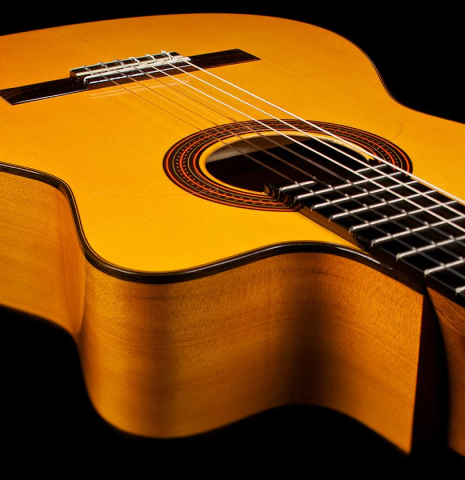 The top, side and cutaway of a 2018 Felipe Conde "FP 14" (cutaway electric) flamenco guitar made of spruce and cypress