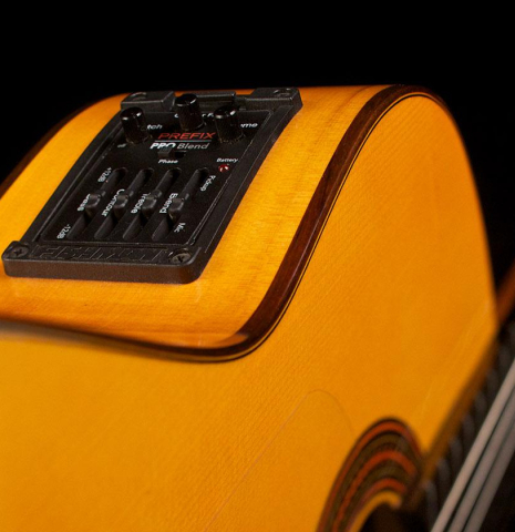 The electronics and pickup system of a 2018 Felipe Conde "FP 14" (cutaway electric) flamenco guitar made of spruce and cypress