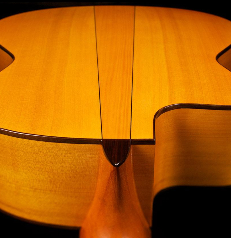 The back, sides and cutaway of a 2018 Felipe Conde "FP 14" (cutaway electric) flamenco guitar made of spruce and cypress