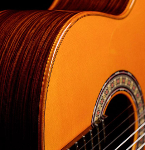 The front and side of a 2019 Felipe Conde "Reedicion 1975" flamenco guitar made with spruce top and pau ferro back and sides 