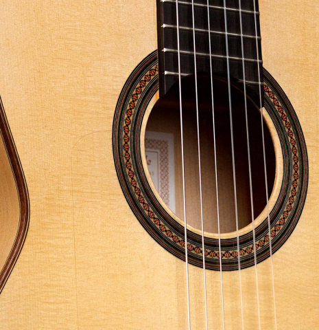 The soundboard and side of a 2019 Felipe Conde "FP 16" flamenco guitar made of spruce and cypress