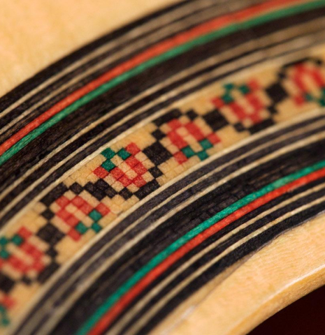 A close-up of the rosette of a 2019 Felipe Conde &quot;FP 16&quot; flamenco guitar made of spruce and cypress