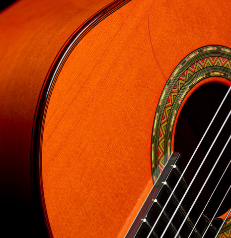 The top binding, side and soundboard of a 2016 Felipe Conde "FC 26" flamenco guitar made of spruce and cypress