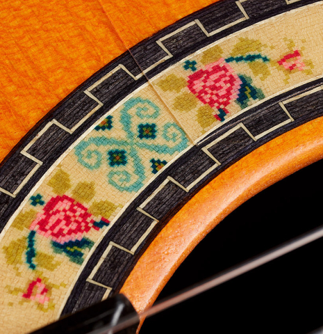 Close-up detail of the rosette of a 2024 Felipe Conde "FC 28 Especial" flamenco negra guitar made of spruce and CSA rosewood