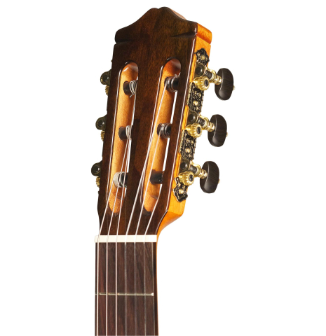 The headstock of a Cordoba "GK Studio" flamenco guitar made of spruce and cypress