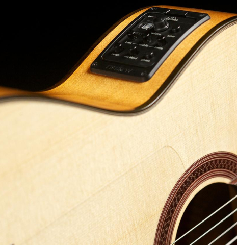 The elecronics of a Cordoba "GK Studio" flamenco guitar made of spruce and cypress