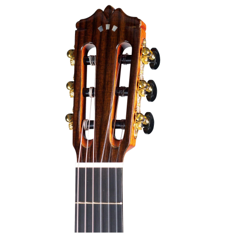 The headstock of Cordoba "GK Pro Negra" classical guitar made with spruce and Indian rosewood, cutaway and electronics