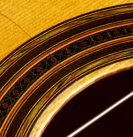 Detail of the rosette of a 2018 Luis Fernandez de Cordoba "Blanca" flamenco guitar made of spruce and cypress