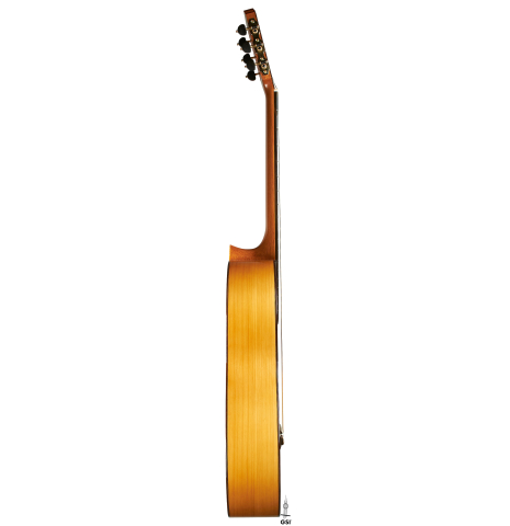 The side of a 2018 Luis Fernandez de Cordoba "Blanca" flamenco guitar made of spruce and cypress