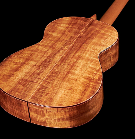 The back and sides of a 2023 Felipe Conde Crespo "Negra" flamenco guitar made of spruce and koa