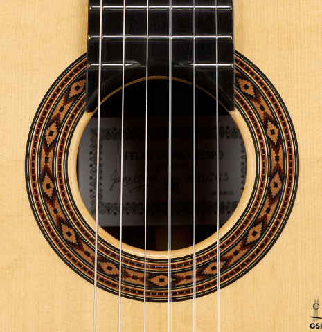 The rosette of a 2023 Felipe Conde Crespo "Negra" flamenco guitar made of spruce and African rosewood