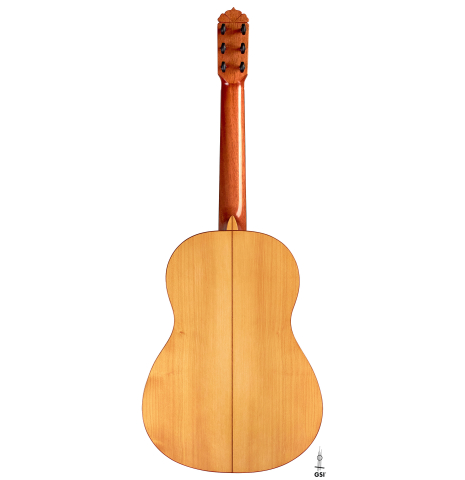 The back of a a 2015 Andy Culpepper flamenco guitar made with cedar and cypress wood on a white background.