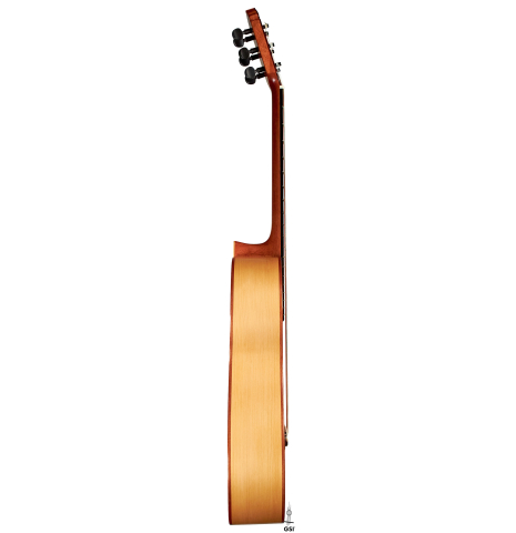 The side of a a 2015 Andy Culpepper flamenco guitar made with cedar and cypress wood on a white background.