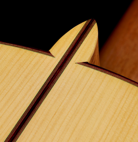 The heel, back binding and center seam of a 2024 Andy Culpepper w/pegs flamenco guitar made of cedar and cypress